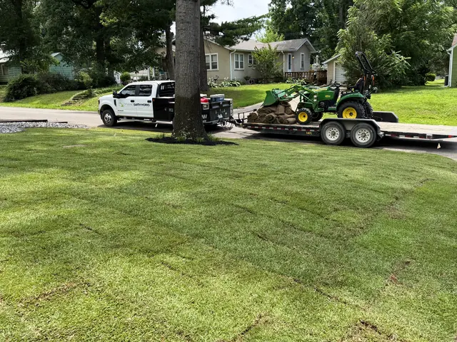 Finished sod lawn running along a driveway