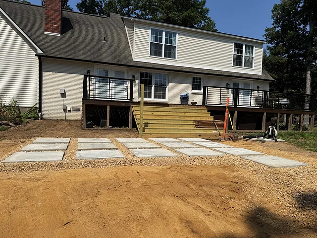 Slab patio tied into an existing deck